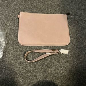 Thirty one rubi mini and wrist strap. Brand new